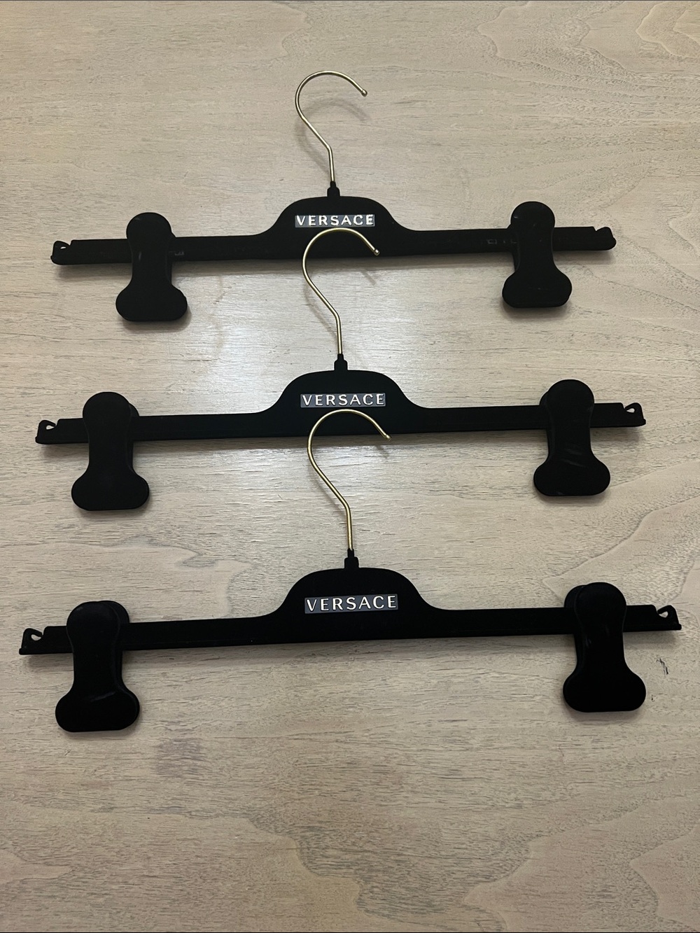 Hangers with Versace label